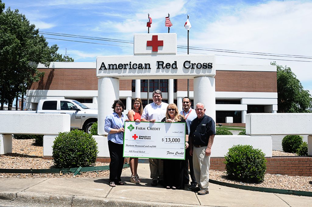 (From left)  Jill Robertson with Farm Credit of Western Arkansas, Lauren Burns with Delta Agricultural Credit Association,  Cole Plafcan with AgHeritage Farm Credit Services and (far right) Randy Kingston with Farm Credit Midsouth present Farm Credit’s donation to Pam Knapp-Carver, executive director for the Northeast Arkansas chapter of the American Red Cross, and Steve Biernacki, regional philanthropy officer.  